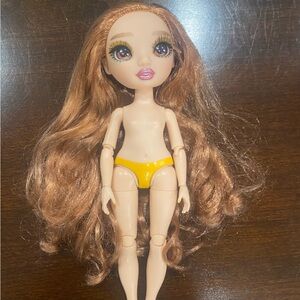 Stylish Doll with Flowing Brown Hair and Yellow Shorts